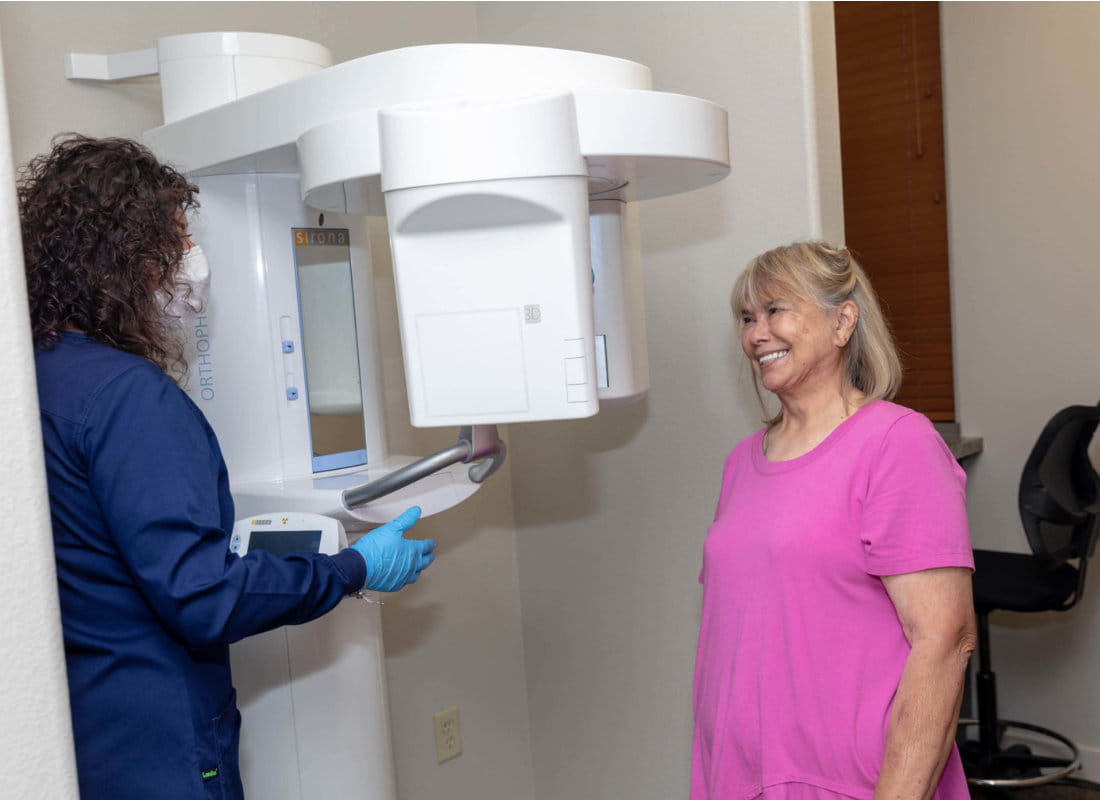 patient about to get dental x-ray. She is able to stand or sit and there is room to be comfortable